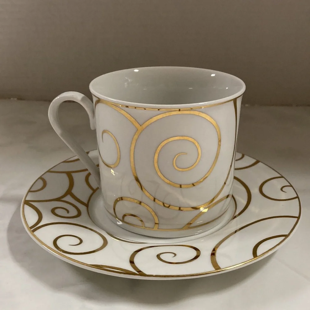 Pier 1 Gold Swirl Porcelain Cup and Saucer Set